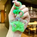 Star-shaped acrylic liquid keychain with green sequins and starfish glitter decor - Green Star With Matching Hardware