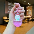 Niedlicher Pinguin-Schlüsselanhänger mit flüssigem Treibsand und rosa Glitzer - Rosa Hase (Farbenfrohe Hardware)