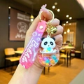 Panda bubble tea liquid keychain with pink silicone strap and golden bell accessory - Rainbow Panda