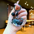 Blue winged heart shaker keychain with glitter beads and a matte black ring - Lobster Clasp Style / Black