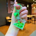 Portachiavi tartaruga liquida tenuto in mano con glitter verdi e ciondolo galleggiante - Stile Chiusura a Moschettone / Borsa di Moda Hardware Verde Tartaruga