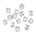 Macro shot of 8mm faceted transparent crystal cube beads with precision cut for DIY jewelry - Clear