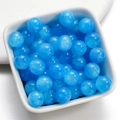 Close-up of sparkling blue resin mermaid beads for DIY jewelry making in a white bowl - Blue / 8mm