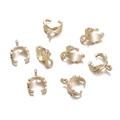 Detailed close-up of golden leaf-shaped bail clasps for DIY jewelry making - 50 Pieces/Pack (4.5*8.5*11mm) / 16K Gold