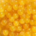Gros plan de perles rondes en verre jaune poli pour la création de bijoux DIY - 6mm / 50 Pièces / Orange