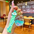 Detail of sweet heart keychain with green wrist strap and blue liquid sand heart - Sweet Heart Strap Luminous Beads Heart Lock / Green