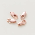 Close-up of four rose gold lobster clasps for DIY jewelry making and necklaces - 10 Pieces/Pack (5x10mm) / Rose Gold Plated