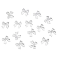 Flat lay of transparent resin bow charms for nail art and DIY craft accessories - 100pcs Pack / White