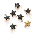Macro detail of seven star-shaped stainless steel charms with black enamel and 18k gold plating - 1 Piece / Gold Base Black