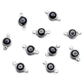 Macro shot of silver stainless steel evil eye connector pendants for DIY jewelry making - Double Bail / 10 Pieces Pack / Silver Black Onyx