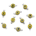 Macro shot of stainless steel evil eye connector pendants with glass beads for DIY jewelry - Double Bail / 10 Pieces Pack / Steel Color Yellow Gem