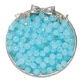 Macro shot of 8x7mm light blue translucent glass apple beads on a silver tray - Blue White