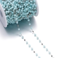 Detailed close-up of sky blue cat eye beads and silver metal chain on a white spool - 1 Meter / Non-Coiled (Bead Diameter Approx 4.5mm) / Steel Blue