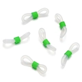 Close-up of translucent white silicone loops with green metal spring adjusters for eyewear - 50 Pieces / White-Green (AC3134)