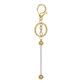 Détail d'un porte-clés DIY avec perles, fermoir mousqueton doré et pendentif métallique - Accessoires pour porte-clés / Plaqué Or