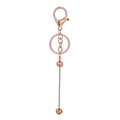 Close-up of rose gold DIY beaded keychain components with lobster clasp and metal rod - Keychain Accessories / Electroplated Rose Gold