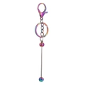 Macro view of gradient rainbow metal keychain with lobster clasp and beaded bar detail - Keychain Accessories / Electroplated Iridescent