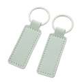 Set of two mint green rectangular faux leather keychains with silver rings - Stitched Rectangle-Aqua Green