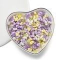 4mm acrylic peanut beads in pastel and clear colors displayed in a heart-shaped ceramic bowl - Transparent Purple Mix