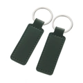 Set of two rectangular dark green faux leather keychains with silver metal ring and stitching - Stitched Rectangle-Dark Green