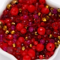 Macro view of multi-colored mixed faceted crystal beads in a white floral dish for DIY jewelry - 1 Pack / Porcelain Red