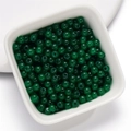 Perles en verre vert foncé pour création de bijoux DIY présentées dans un bol en céramique - 4mm / 50 Pièces / Vert clair