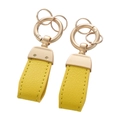 Set of two bright yellow lychee grain faux leather keychains with light gold metal hardware - Horseshoe Buckle-Yellow