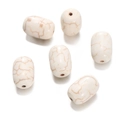 Detailed view of six oval white turquoise beads with marbled texture and drill holes - Oval Barrel Bead (12) / 1 Piece / Creamy White with Brown Veins