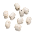 Macro detail of barrel-shaped white turquoise beads with brown marble texture and pre-drilled holes - Cylindrical Barrel Bead (13) / 1 Piece / Creamy White with Brown Veins