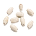 Detailed view of oval synthetic white turquoise beads with natural brown marble texture - Oval Loose Bead (14) / 1 Piece / Creamy White with Brown Veins
