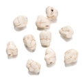 Macro view of nine irregular white turquoise beads with natural brown mesh texture and holes - Freeform Bead (17) / 1 Piece / Creamy White with Brown Veins