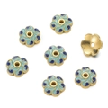 Detailed macro view of 10mm flower-shaped blue enamel and 18K gold finish beads for jewelry - Blue (07)