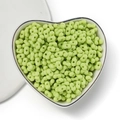 Light green 4mm acrylic peanut beads in a white heart bowl for DIY jewelry making - Solid Green