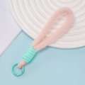 Detail van macaron pluche koord met muntgroen geweven touw en een duurzame plastic ring - Perzikroze Pluche Met Muntgroene Ring (01)