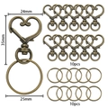 Vista dettagliata del set da 10 moschettoni a cuore e anelli portachiavi bronzo con misure - 10 Chiusure E 10 Anelli / Bronzo Antico
