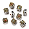 Detailed view of Tibetan silver drum beads with golden relief and turquoise inlay - 1pc/pack / Style 10 (Square Inlaid Bead)