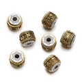 Close-up of Tibetan style gold and silver cylinder beads with lotus and mantra engravings - 1pc/pack / Style 17 (Tibetan Six-word Bead)