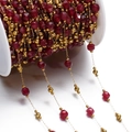 Detail of red faceted stone chain with gold beads on a spool for DIY jewelry - Gold Style 05