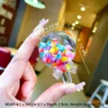Lollipop keychain detail with colorful beads, size 4.1x6.1x2.9 cm and weight 35g - Lollipop Shape