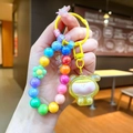 Detail of colorful beaded keychain with letter charms and yellow resin bear pendant - Rainbow Beaded Electroplated Cartoon Charm / Yellow