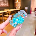 Macro detail of a transparent candy charm with blue beads and floral resin textures - Pendant Only (Without Clasp-Green)