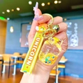 Creative astronaut liquid keychain with unicorn strap and golden bell accessories - Yellow Luminous Bubble Bead Gas Tank