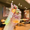 Cute orange liquid unicorn keychain with sparkling star glitter and golden bell - Orange Luminous Bubble Bead Backpack