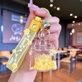 Yellow castle acrylic liquid quicksand keychain with Happy Moments silicone strap - Yellow Luminous Bubble Bead Castle
