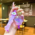 Porte-clés cœur à paillettes liquides avec sangle Sweet Heart et cloche dorée - Violet