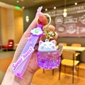 Dettaglio portachiavi a forma di gatto con glitter liquidi viola e cinturino - Luminoso / Viola