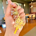 Starry sky lollipop keychain with gold bell and yellow star sequins in acrylic charm - Noctilucent Yellow Lollipop