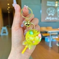 Lollipop keychain with yellow oil and floating glitter, golden ring and bell - Yellow Snowflake Lollipop