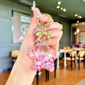 Star-shaped acrylic keychain with pink and blue liquid glitter and golden metal lobster clasp - Pink Colorful Bead Pentagram