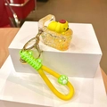 Llavero creativo perro Pompompurin inodoro con purpurina y correa de silicona amarilla - Inodoro De Pvc Amarillo Que Brilla En La Oscuridad